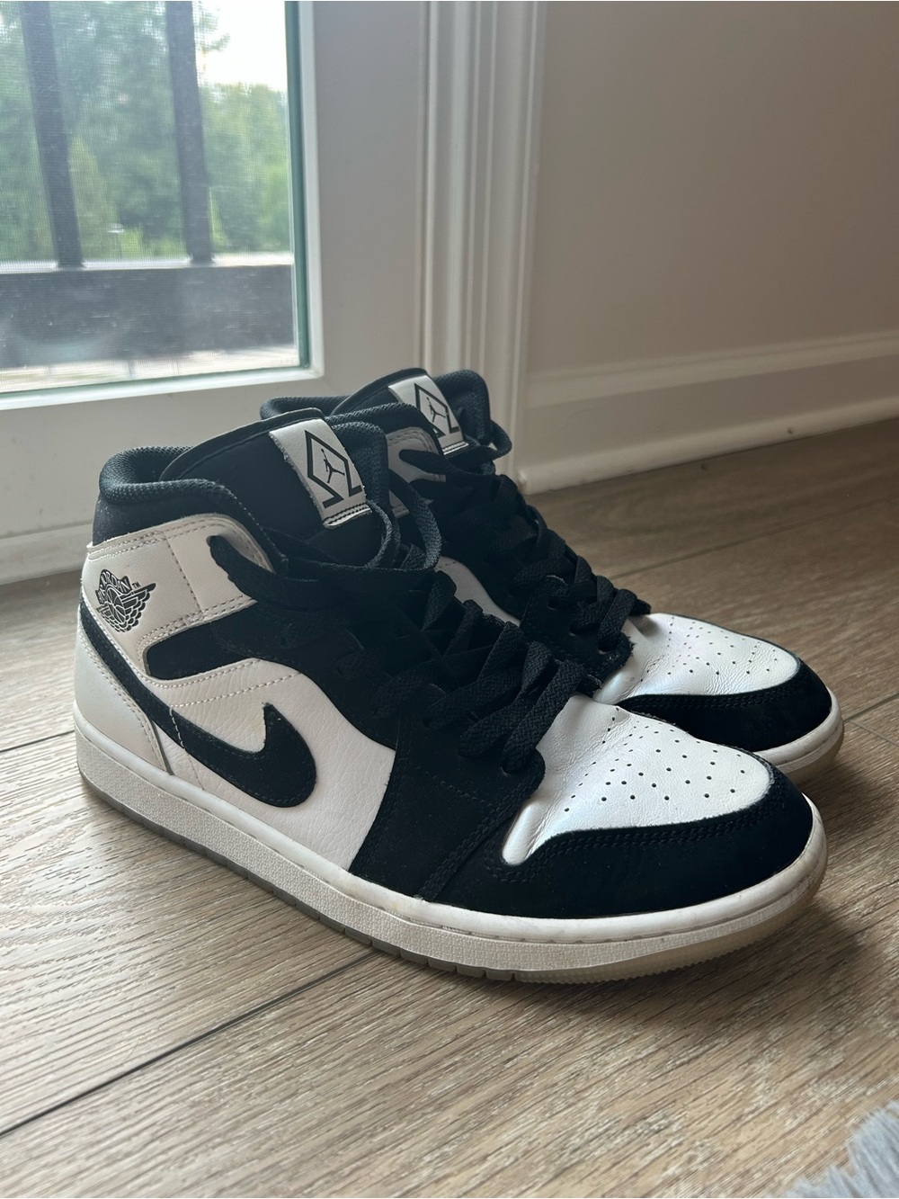 Nike Black and White Mid-Top Sneakers
